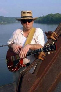 Greg O'Brien poses with his guitar